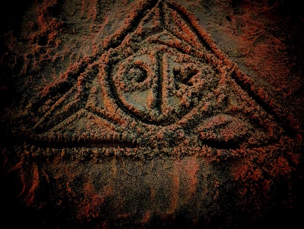 Dom and Rosa enjoyed making sand runes.  This is Don's unique take on the deathly hallows.
